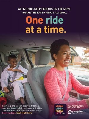 Poster shows an image of a black mom driving a minivan and her 9-year-old son in the back wearing a martial arts outfit.